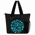 Black Baby It’s Cold Outside tote bag with blue snowflake design, zipper, long straps, front pocket, and side mesh pocket