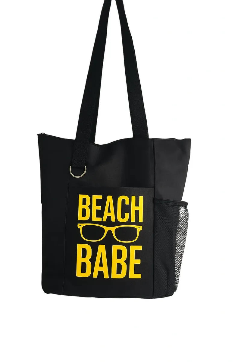 Black tote bag with yellow beach babe text design, reusable fabric tote bag for beach days, summer trips, shopping, and everyday carry