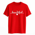 Red graphic T shirt featuring the word Beautiful in elegant white script lettering on a comfortable casual women's short sleeve tee.