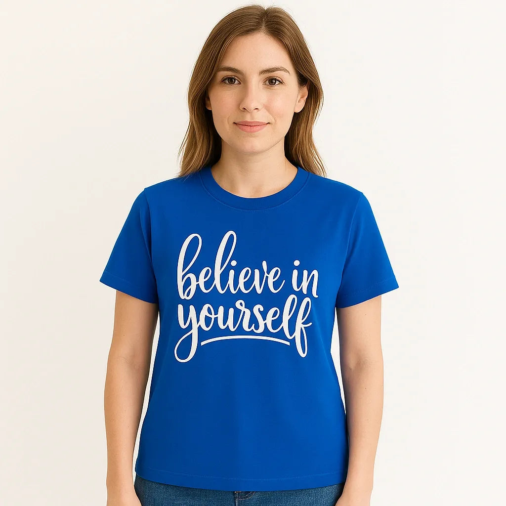Royal blue graphic t-shirt with white script text reading believe in yourself, inspirational short sleeve tee for everyday wear