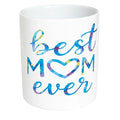 White ceramic mug featuring the phrase "Best Mom Ever" in soft blue and teal lettering. Thoughtful coffee mug gift for moms, Mother's Day, birthdays, Christmas, baby showers, and everyday appreciation. Perfect for coffee, tea, hot cocoa, and daily use.
