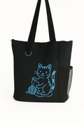 Black tote bag featuring a blue cat graphic design on the front. Lightweight reusable shoulder tote with long handles for comfortable carrying. Perfect for shopping, books, work, travel, errands, school, and everyday use. Stylish cat artwork adds a fun and modern touch to this practical carryall tote. Ideal for cat lovers, pet owners, students, teachers, and anyone looking for a fashionable and functional everyday tote bag.