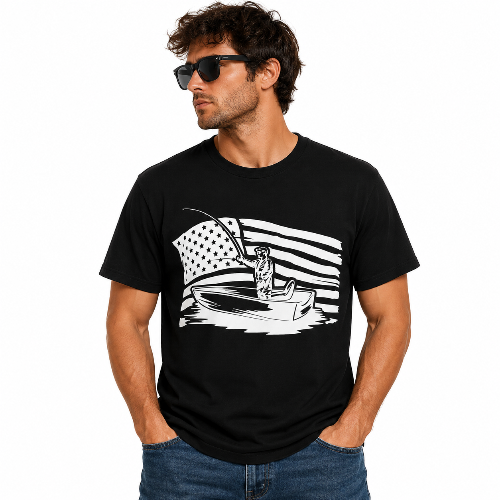 A man wearing a black short-sleeve t-shirt with a white graphic of a fisherman in a boat against an American flag design, paired with blue jeans and black sunglasses, on a solid white background.