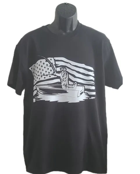 Black Fish American Flag Graphic T-Shirt featuring a fish silhouette layered over a distressed American flag design. Patriotic fishing shirt for anglers, fishermen, outdoor enthusiasts, lake trips, boating adventures, and everyday casual wear.