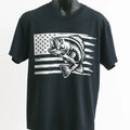 Black Fish Flag Graphic T-Shirt featuring a detailed fish design over a distressed American flag graphic. Patriotic fishing shirt for anglers, fishermen, outdoor enthusiasts, lake trips, boating adventures, and everyday casual wear.