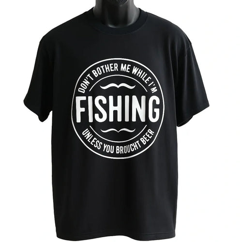 Black graphic t-shirt featuring a vintage circular fishing badge design with bold fishing text. Perfect for anglers, fishermen, outdoor enthusiasts, lake trips, fishing weekends, camping adventures, and casual everyday wear.
