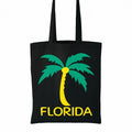 Black cotton tote bag with bright green and yellow Florida palm tree graphic design, reusable tropical beach shopper bag for travel, vacation, shopping, school, summer outings, and everyday carry by LB AND SK DESIGN SHOP