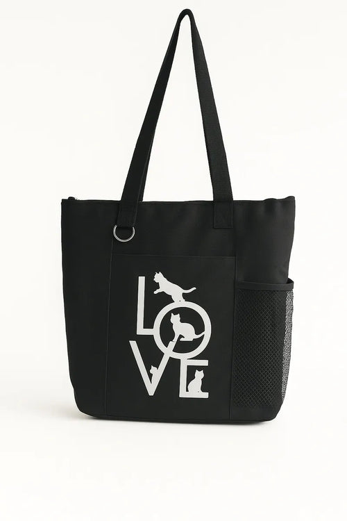 Black tote bag featuring a white LOVE script design on the front. Lightweight reusable shoulder tote with long handles for comfortable carrying. Ideal for shopping, work, books, errands, travel, school, gifts, and everyday use. Simple minimalist fashion accessory with a modern black and white design that pairs easily with casual outfits. Durable tote bag suitable for women, teens, students, teachers, and anyone looking for a stylish and practical everyday carry bag.