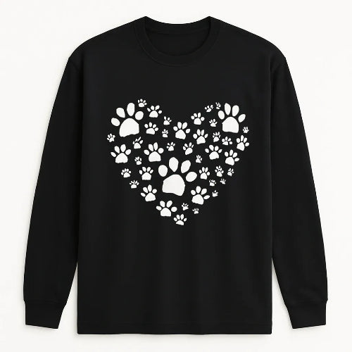 Black long sleeve shirt featuring a white heart made of paw prints, pet lover graphic shirt for dog lovers, cat lovers, animal rescue supporters, and everyday casual wear
