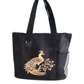 Black tote bag featuring an elegant gold peacock design. Reusable shoulder tote bag for shopping, work, school, travel, books, groceries, and everyday errands. Lightweight and durable carryall with comfortable straps and artistic peacock artwork. Perfect gift for bird lovers, nature enthusiasts, women, teachers, and anyone who appreciates unique fashion accessories.