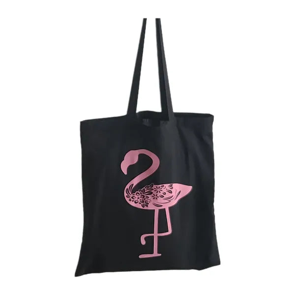 Shop the Black Pink Flamingo Cotton Tote Bag featuring a tropical pink flamingo design. Lightweight reusable cotton bag for shopping, travel, beach, and everyday use.