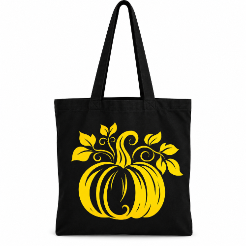 Black cotton tote bag with bold yellow decorative pumpkin, leaves and swirling vine design on a white background.