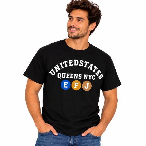 Man wearing a black Queens NYC graphic T-shirt with white lettering and colorful E F J subway-style circles.