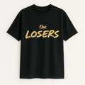 Black graphic t shirt featuring bold The Losers text design in a stylish streetwear-inspired font, perfect for casual outfits, urban fashion, and everyday wear.