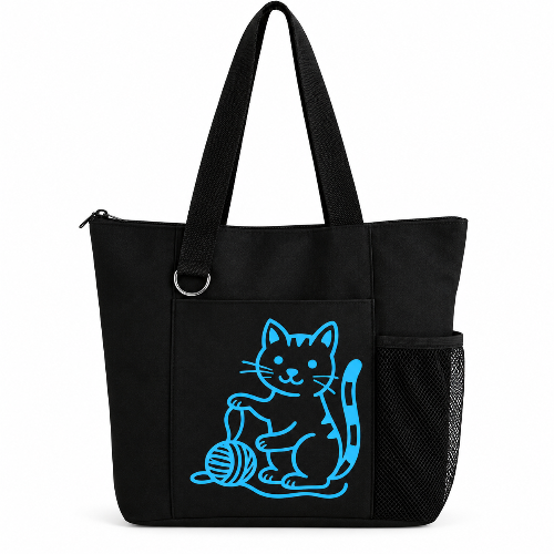 Black reusable tote bag featuring a bright blue cat playing with yarn, long shoulder straps, zipper closure, front pocket, silver D-ring, and side mesh pocket.