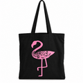 Black cotton tote bag with pink floral flamingo design and long shoulder straps on a white background.