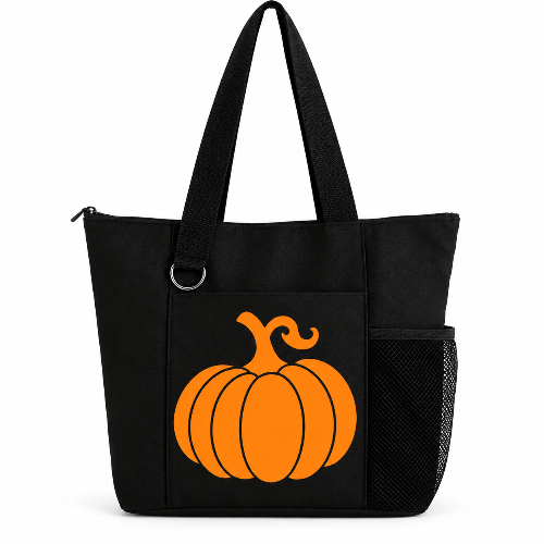 Black reusable tote bag with large orange pumpkin graphic, long shoulder straps, zipper closure, front pocket, silver D-ring, and side mesh pocket.
