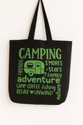Black cotton tote bag with green camping adventure typography design, reusable shoulder bag for hiking, travel, shopping, outdoor lovers, camping trips, nature enthusiasts, everyday carry tote, eco friendly fabric tote bag with long straps and minimalist adventure style print