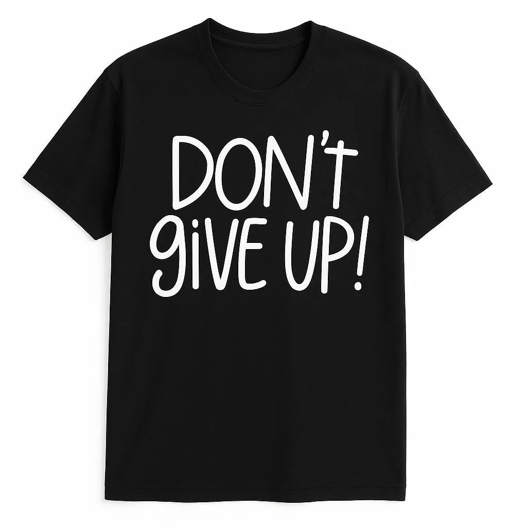 Black graphic t-shirt featuring the motivational phrase "Don't Give Up" in bold white typography. Inspirational unisex shirt designed for positivity, resilience, encouragement, confidence, strength, and everyday casual wear.