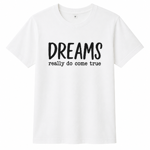A white short-sleeve crewneck t-shirt with the text 'DREAMS really do come true' printed in black on the front, displayed against a solid white background.