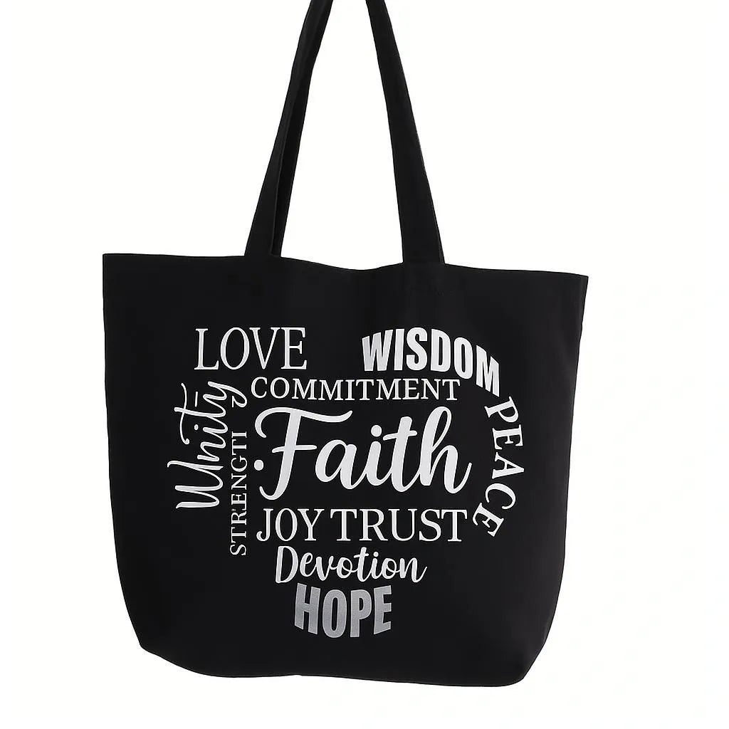 Black cotton tote bag with faith word art typography design featuring faith, hope, trust, love, joy, and inspiration words, reusable shoulder tote for church, shopping, travel, work, and everyday carry