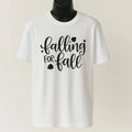 White graphic t-shirt featuring the phrase "Falling for Fall" in stylish seasonal typography. Cozy autumn-inspired unisex shirt perfect for pumpkin patch visits, fall festivals, sweater weather, Thanksgiving gatherings, and casual seasonal outfits.