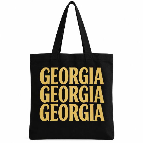 Black cotton tote bag with Georgia repeated three times in bold gold lettering.