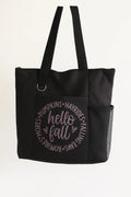 Black tote bag featuring a cozy "Hello Fall" seasonal design in autumn-inspired colors. Reusable fall-themed tote bag perfect for shopping, pumpkin patch visits, farmers markets, work, school, books, groceries, and everyday essentials. Lightweight and durable shoulder bag designed for autumn lovers and seasonal style.