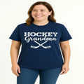 Navy blue graphic T shirt featuring Hockey Grandma text and crossed hockey sticks design for proud hockey loving grandmothers