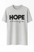Gray graphic t-shirt featuring the uplifting phrase "Hope Always" in bold black typography. Inspirational unisex shirt designed to promote positivity, encouragement, faith, resilience, optimism, and everyday comfort.