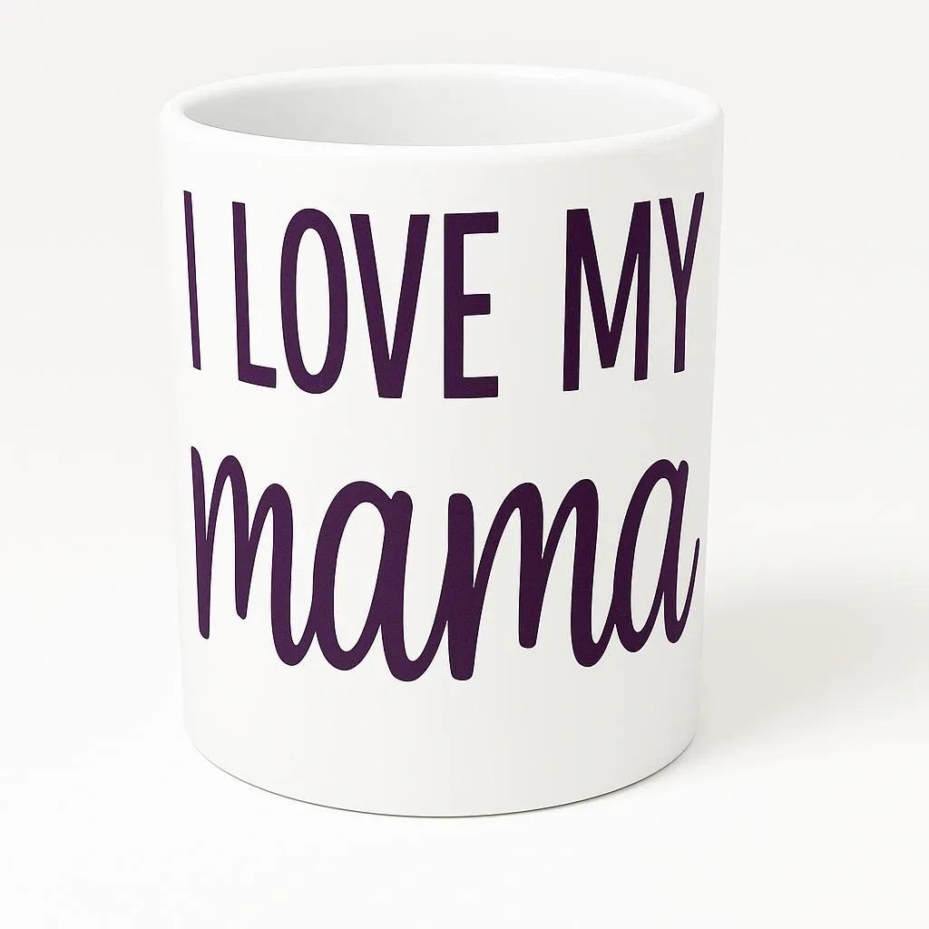 White ceramic mug featuring the phrase "I Love My Mama" in soft purple lettering. Thoughtful gift mug for moms, Mother's Day, birthdays, Christmas, and everyday appreciation. Perfect for coffee, tea, hot cocoa, and daily use at home or the office.