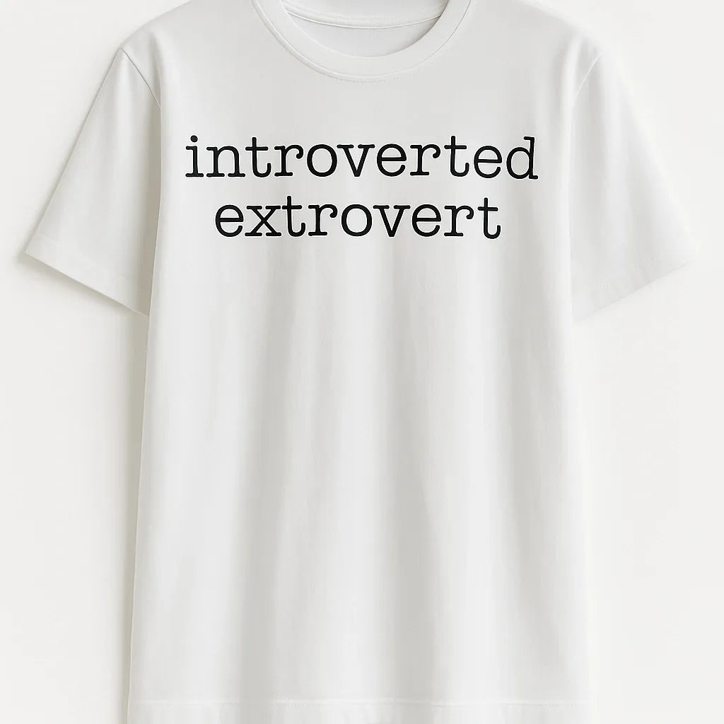 White graphic t-shirt featuring the phrase "Introverted Extrovert" in minimalist typography. Funny personality statement shirt perfect for introverts, extroverts, ambiverts, casual wear, social humor, and everyday fashion.