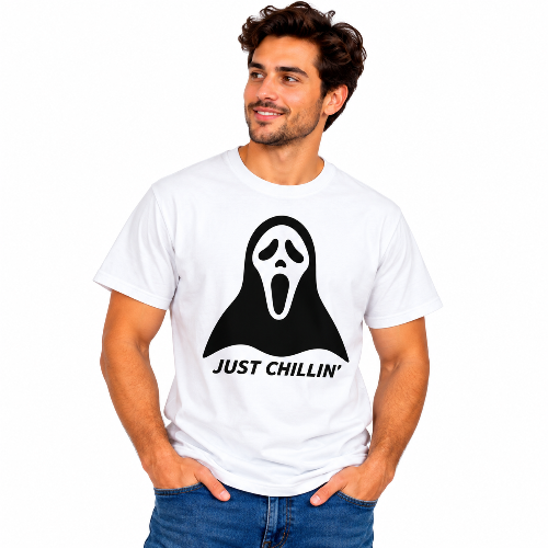 Man wearing a white Just Chillin ghost graphic T-shirt with a large black ghost design.