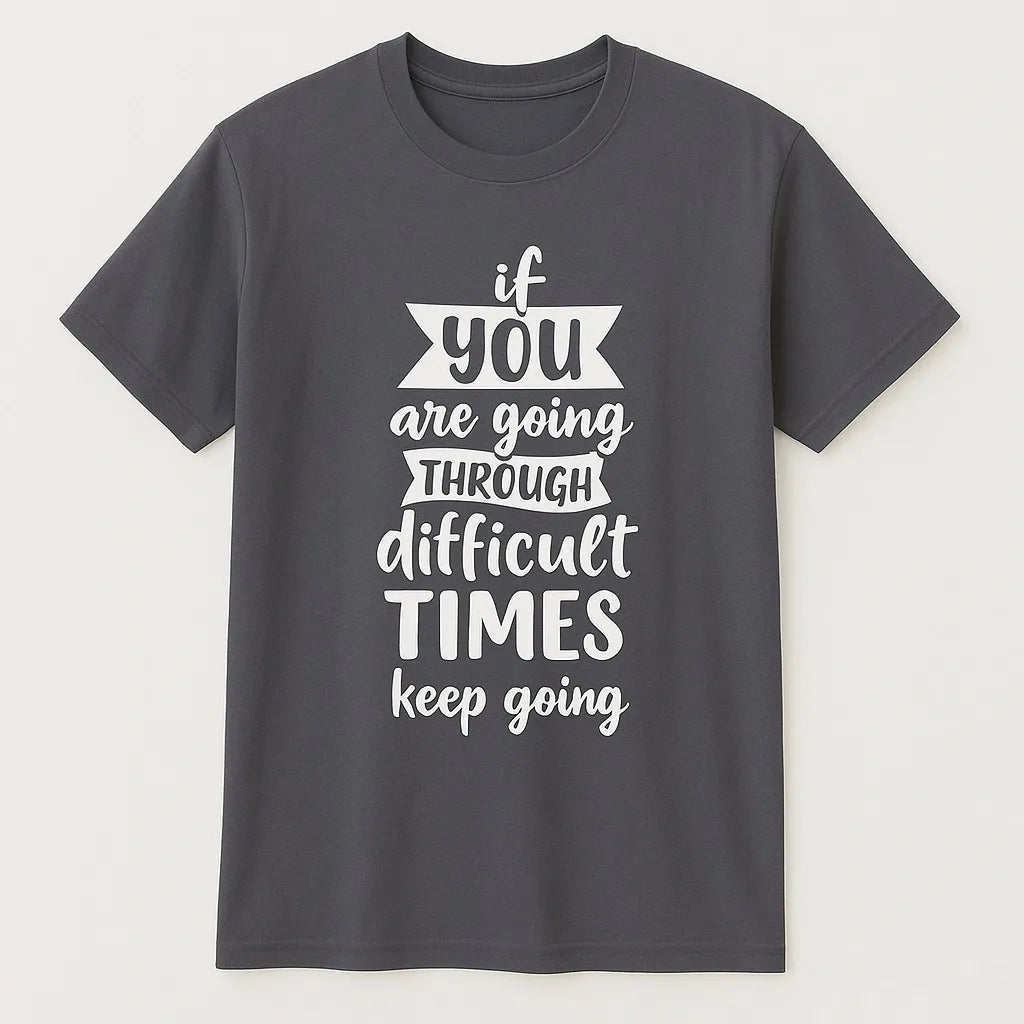 Dark gray graphic t-shirt featuring an inspirational Keep Going quote in white typography. Motivational unisex shirt designed for encouragement, positivity, perseverance, personal growth, and everyday casual wear