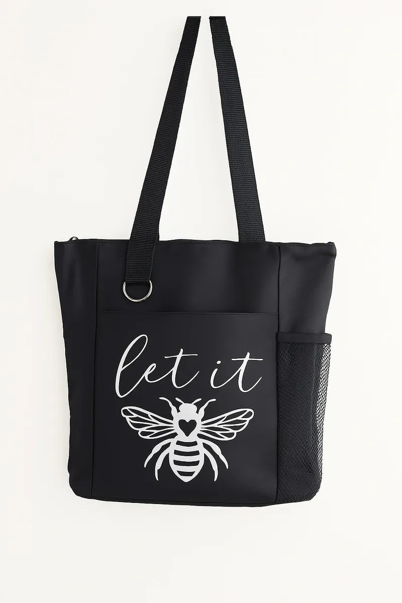 Black tote bag featuring the phrase "Let It Bee" with a detailed bee illustration. Inspirational reusable tote bag perfect for shopping, work, school, travel, books, groceries, and everyday essentials. Lightweight and durable shoulder bag designed to promote calmness, positivity, mindfulness, and appreciation for nature.