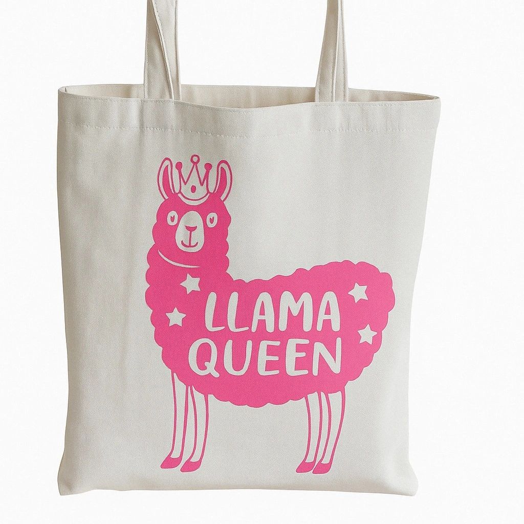 Cute Llama Queen reusable canvas tote bag with pink llama graphic design and shoulder straps on natural beige fabric for shopping, school, books, errands, and daily use