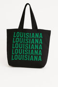 Black cotton tote bag with green Louisiana typography design, reusable state pride shoulder bag for shopping, travel, school, and everyday casual style.