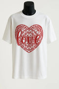 White graphic T-shirt featuring a detailed red heart design with the word Love in the center. Comfortable unisex casual tee for everyday wear, Valentine's Day, gifts, and romantic fashion.