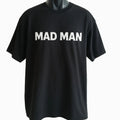 Black MAD MAN graphic short sleeve t shirt featuring a bold minimalist text design for casual streetwear, modern fashion, and everyday comfort.