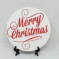 White ceramic coaster featuring elegant red Merry Christmas script lettering, perfect for holiday table decor, Christmas parties, festive gatherings, and seasonal home accents.