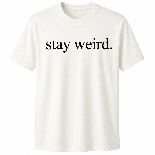 An off-white crewneck t-shirt with the phrase 'stay weird.' printed in black serif lowercase letters across the chest, displayed on a clean white background.