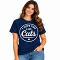 Woman wearing a navy I Hope You Like Cats graphic T-shirt with white lettering.