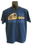 Navy blue graphic t shirt featuring a vintage United States inspired design with classic Americana styling and patriotic casual fashion appeal.