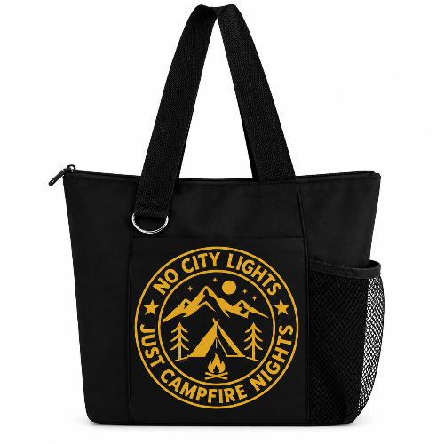 Black camping tote bag with gold No City Lights Just Campfire Nights design, zipper, shoulder straps, and side mesh pocket
