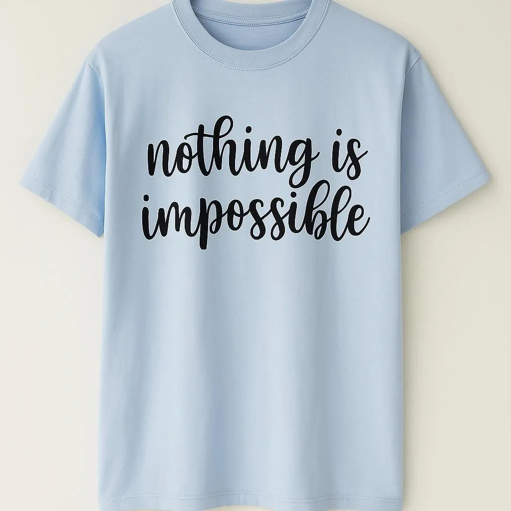 Blue graphic t-shirt featuring the inspirational quote "Nothing Is Impossible" in stylish black typography. Comfortable unisex motivational shirt for everyday wear, positivity, encouragement, and self-confidence.