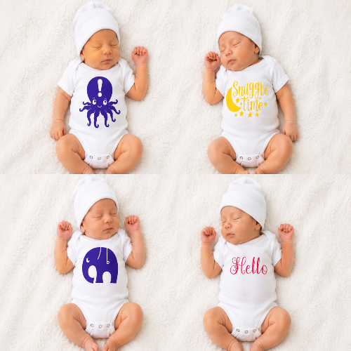 Four newborn babies lying on a white textured blanket, each wearing a white bodysuit and hat with a different graphic design: a purple octopus with an exclamation mark, a yellow crescent moon with the words 'Snuggle Time', a purple elephant with a hanging cord, and the word 'Hello' in pink script.