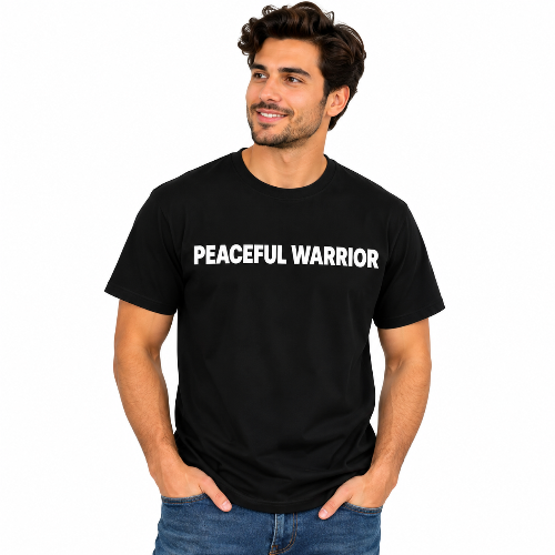 Man wearing a black Peaceful Warrior graphic T-shirt with bold white lettering.