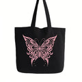 Black cotton tote bag with elegant pink butterfly graphic design, reusable shoulder tote for shopping, travel, work, school, everyday carry, nature lovers, and stylish fashion accessories