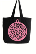 Black cotton tote bag with pink peace symbol graphic design, reusable shoulder tote for shopping, travel, work, school, wellness lifestyle, everyday carry, and inspirational fashion accessories