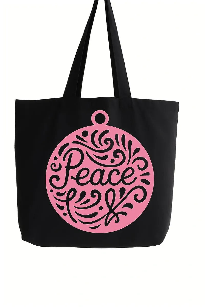Black cotton tote bag with pink peace symbol graphic design, reusable shoulder tote for shopping, travel, work, school, wellness lifestyle, everyday carry, and inspirational fashion accessories
